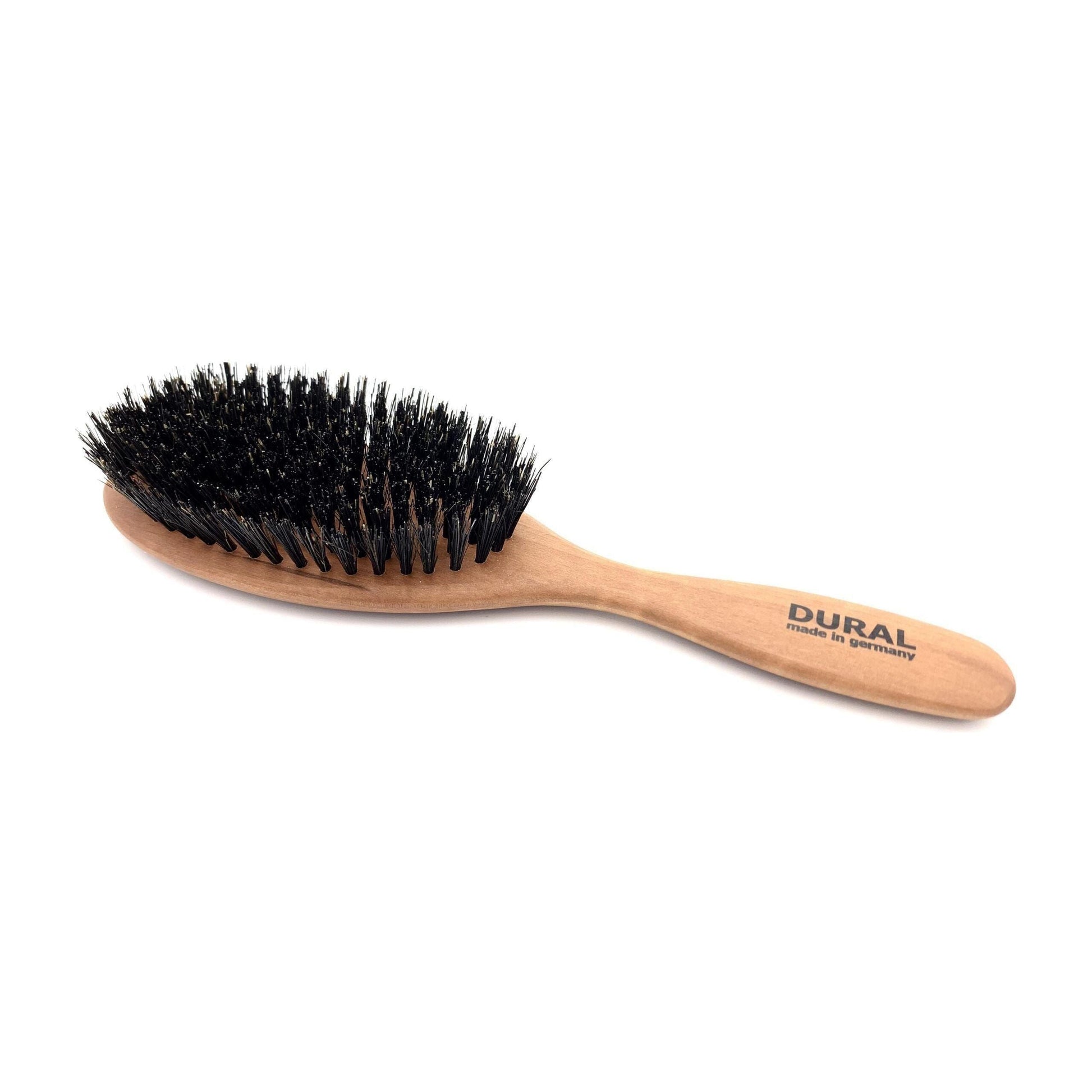 Dural Hair Brush with 10 rows by Pasteur Pharmacy, a professional hairbrush for detangling and styling.