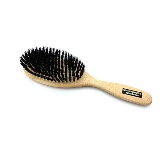 Dural Hair Brush by Pasteur Pharmacy with 10 rows of pure boar bristles for smoothing and styling hair.