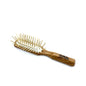 Dural Hair Brush by Pasteur Pharmacy with rubber cushion and long olive wood pins for styling and hair care.