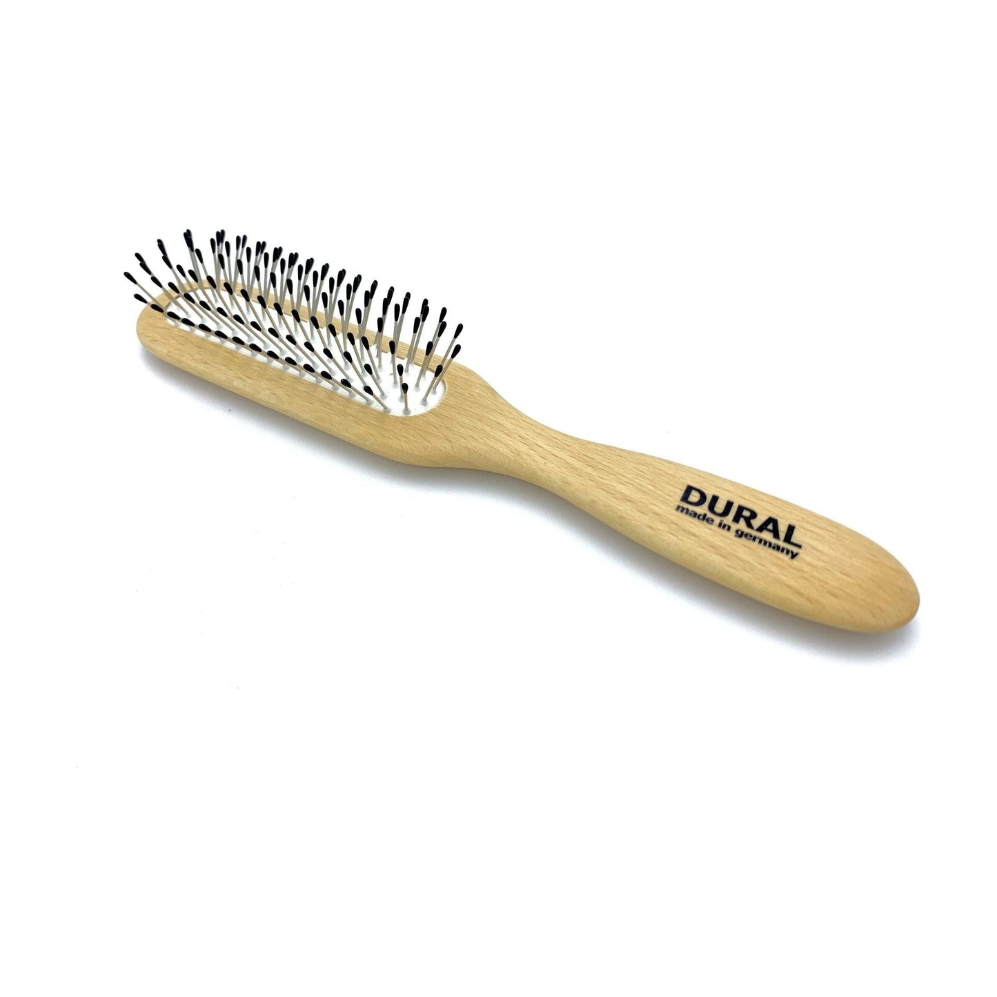 Dural hair brush by Pasteur Pharmacy with rubber cushion, steel pins with ball tips, and beech wood handle for styling and care.