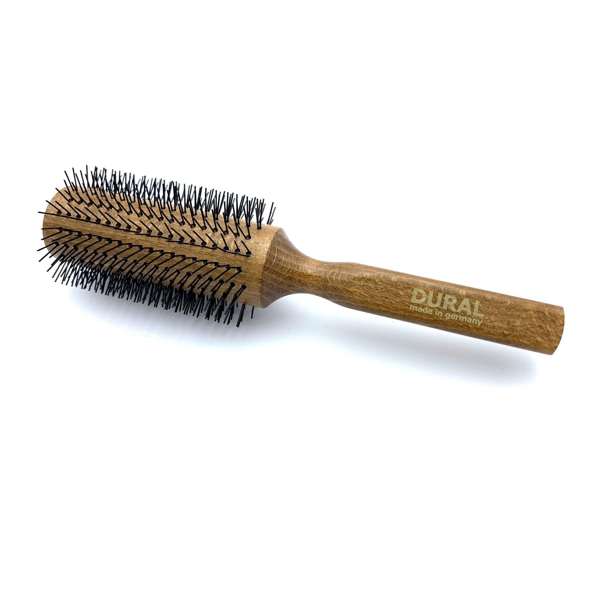 Dural hair styling brush with nylon pins and beech wood handle, designed for gentle grooming and styling.