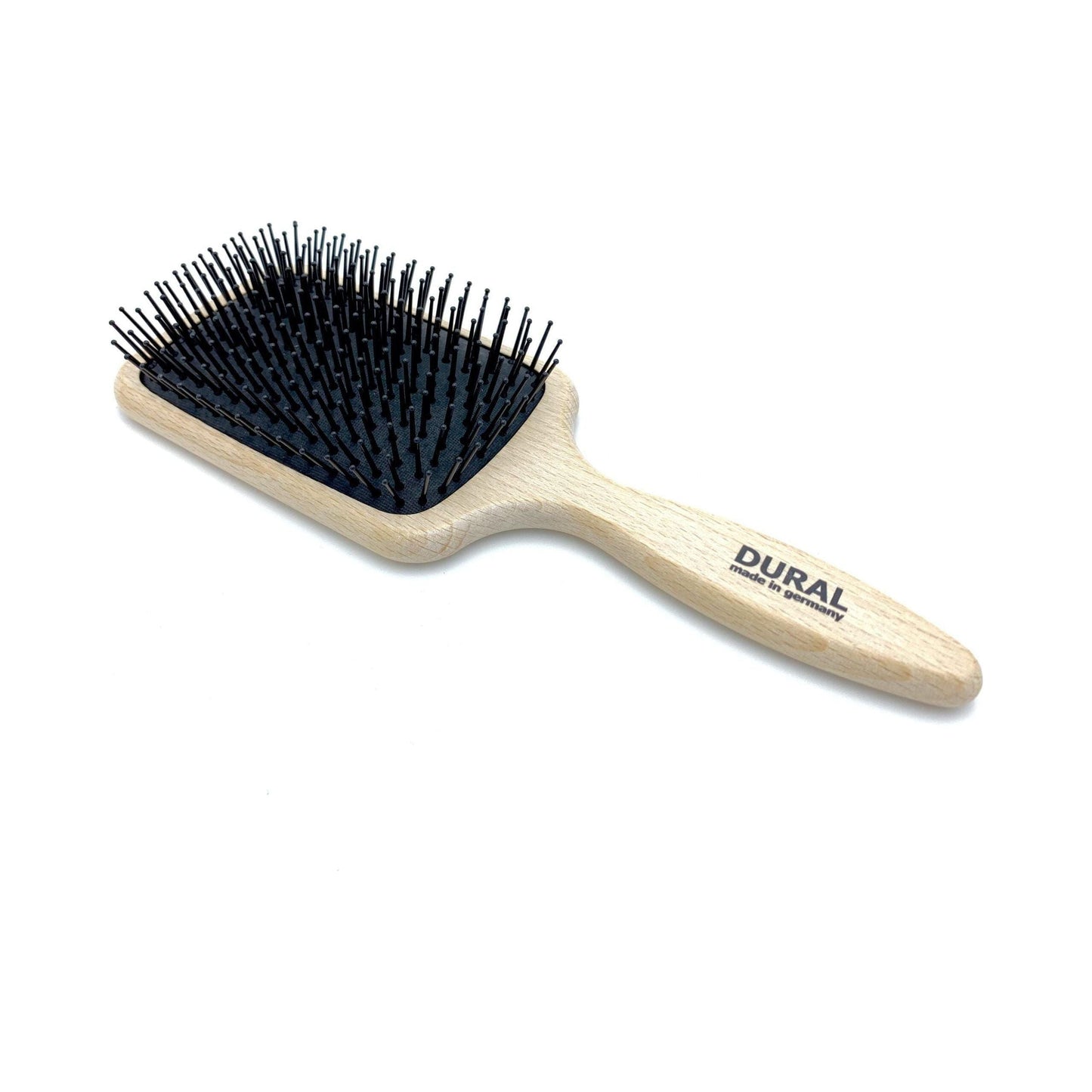 Dural Paddle Hair Brush by Pasteur Pharmacy with plastic pins and beech wood handle for styling and hair care.