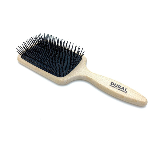 Dural Paddle Hair Brush by Pasteur Pharmacy with plastic pins and beech wood handle for styling and hair care.