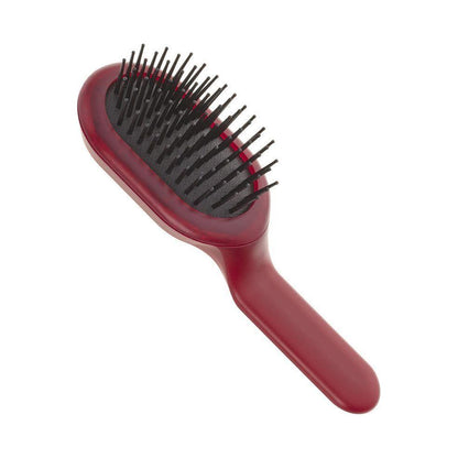 Janeke Curvy Bag Vented Hair Brush in Berry Magenta with ergonomic design, perfect for styling and detangling hair.