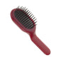 Janeke Curvy Bag Vented Hair Brush in Berry Magenta with ergonomic design, perfect for styling and detangling hair.
