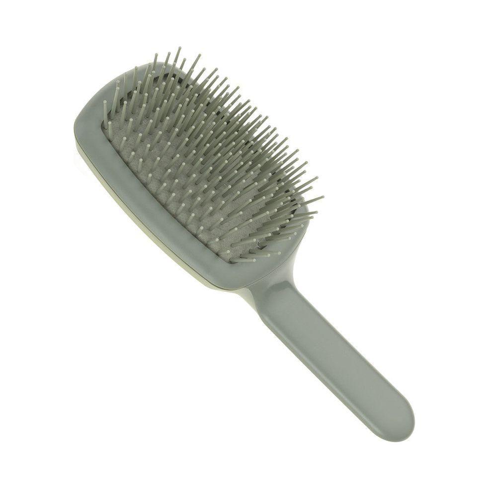 Janeke CURVYM Cyber Lime hair brush with curved design and lime-colored bristles, ideal for detangling and styling hair.
