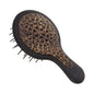 Janeke Mini Superbrush black and spotted hair brush with model No. 71SP220NER MAC for gentle detangling and styling.