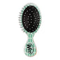Mini teal Wet Brush detangler hair brush with lattice design, designed to gently glide through wet or dry hair.