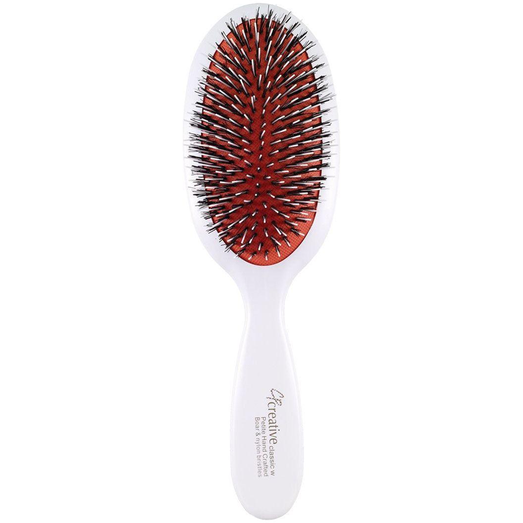 Pasteur Pharmacy Classic Signature White Paddle Hair Brush with boar bristles, designed for gentle, effective hair styling.