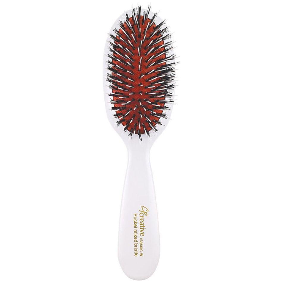 Classic white paddle hair brush with boar bristles by Pasteur Pharmacy, designed for gentle hair detangling and smooth styling.