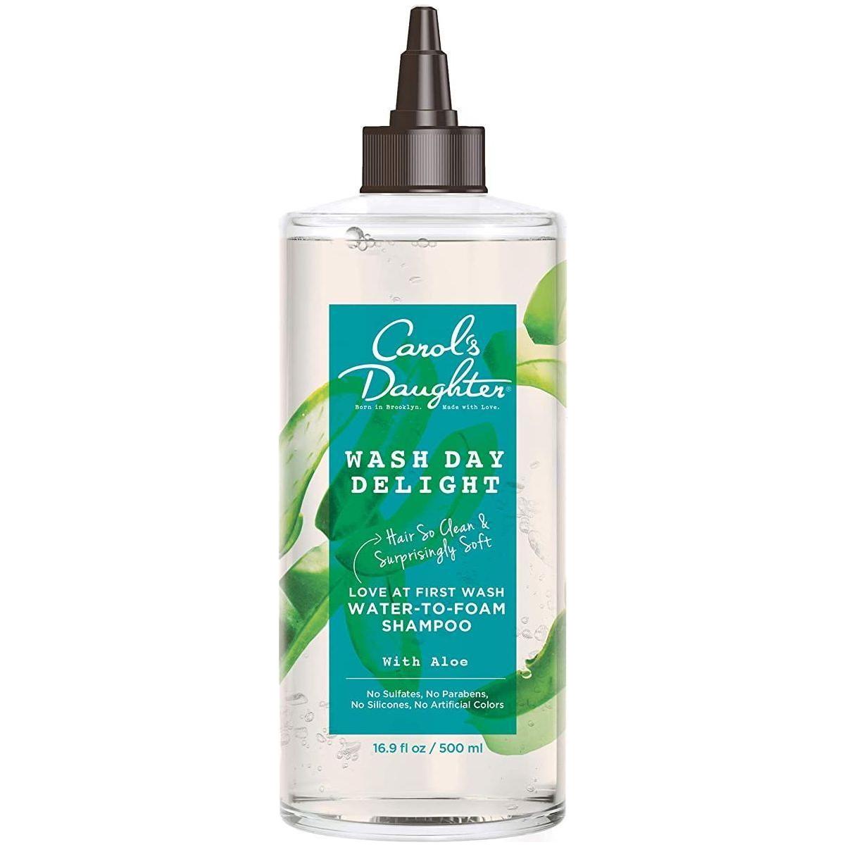 Carol's Daughter Wash Day Delight Aloe Shampoo 500ml for hair care, featuring a clear bottle with green aloe vera extract.