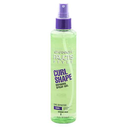 Garnier Fructis Style Curl Shape Defining Spray Gel for curly hair, 8.5 fl oz, in a clear spray bottle with a green cap.