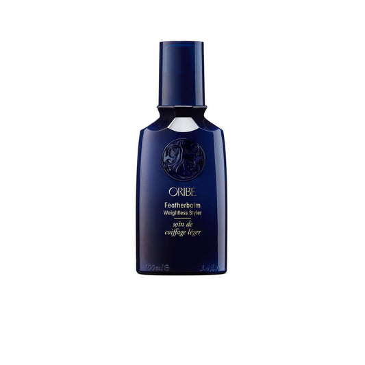 Oribe Feather Balm Weightless Styler for hair care, showing a sleek tube of the lightweight styling product.