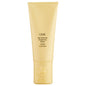 Oribe Hair Alchemy Strengthening Masque in a jar, designed to nourish and reinforce hair with a luxurious hair care treatment.
