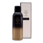 Oribe Impermeable Anti-Humidity Spray for hair, 5.5 oz, in a spray bottle, designed to protect hair from humidity and frizz