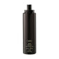 Oribe Royal Blowout heat styling spray for hair care, with a spray bottle and sleek packaging visible in the image.