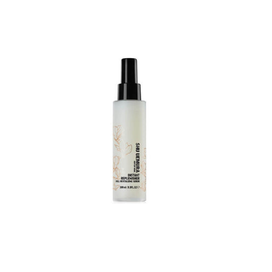 Shu Uemura Instant Replenisher 100ml hair care product bottle with white and gold packaging and pump dispenser.