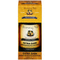 Sunny Isle Extra Dark Jamaican Black Castor Oil bottle for hair care, 4 fl oz, shown in a natural product display.