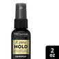 TRESemmé Extra Hold Non-Aerosol Hairspray in 2 fl oz bottle, hair care product with spray nozzle, for strong hold and styling.