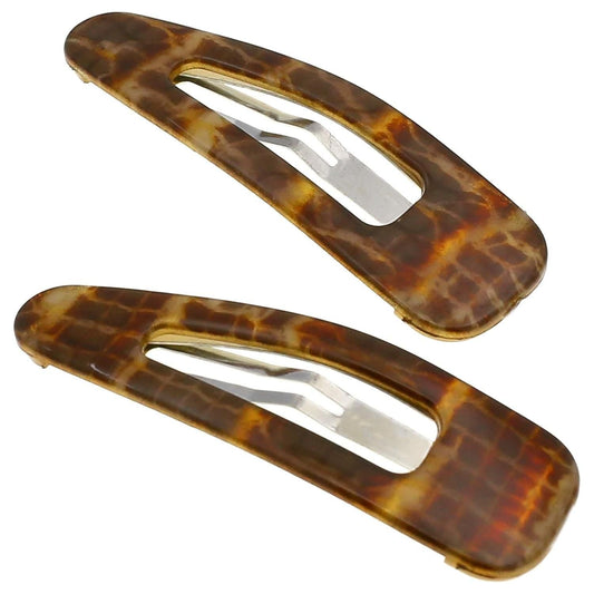 Camila Paris CP3093 hair clips by Pasteur Pharmacy, stylish gold-tone hair accessories with intricate design.