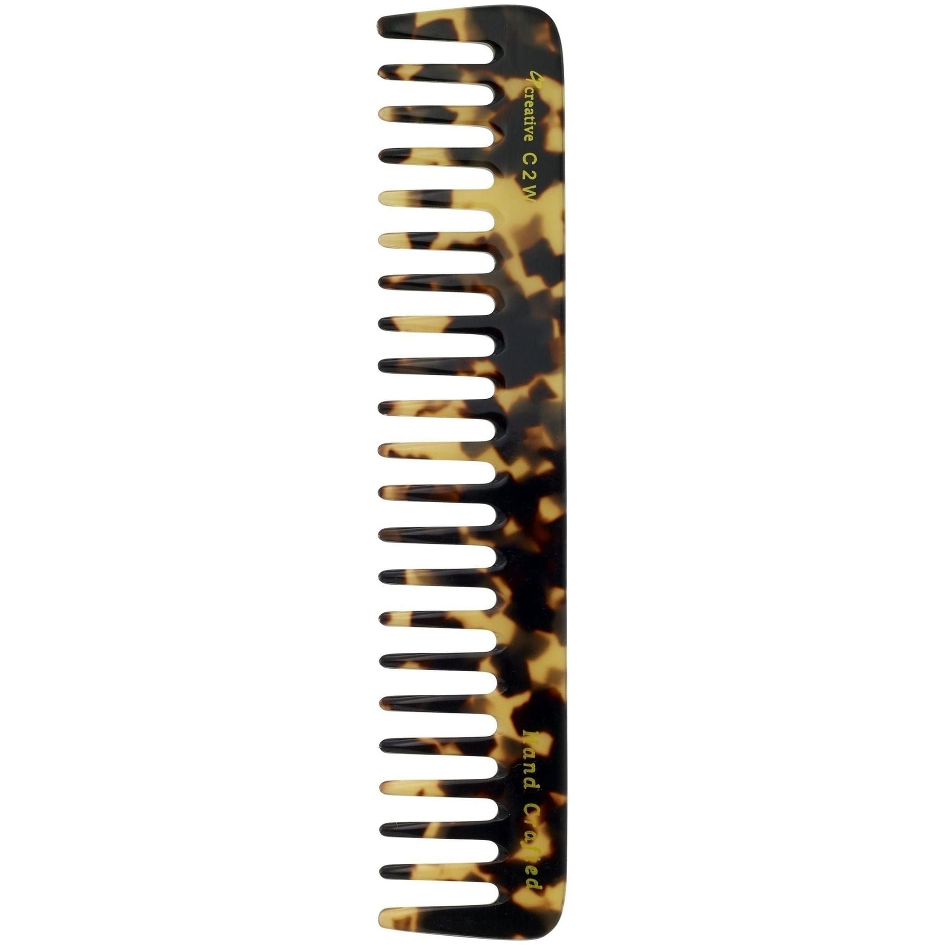 Tortoise-patterned C2W comb by Pasteur Pharmacy, Tokyo dark blond hair comb with sleek design and fine teeth for styling.
