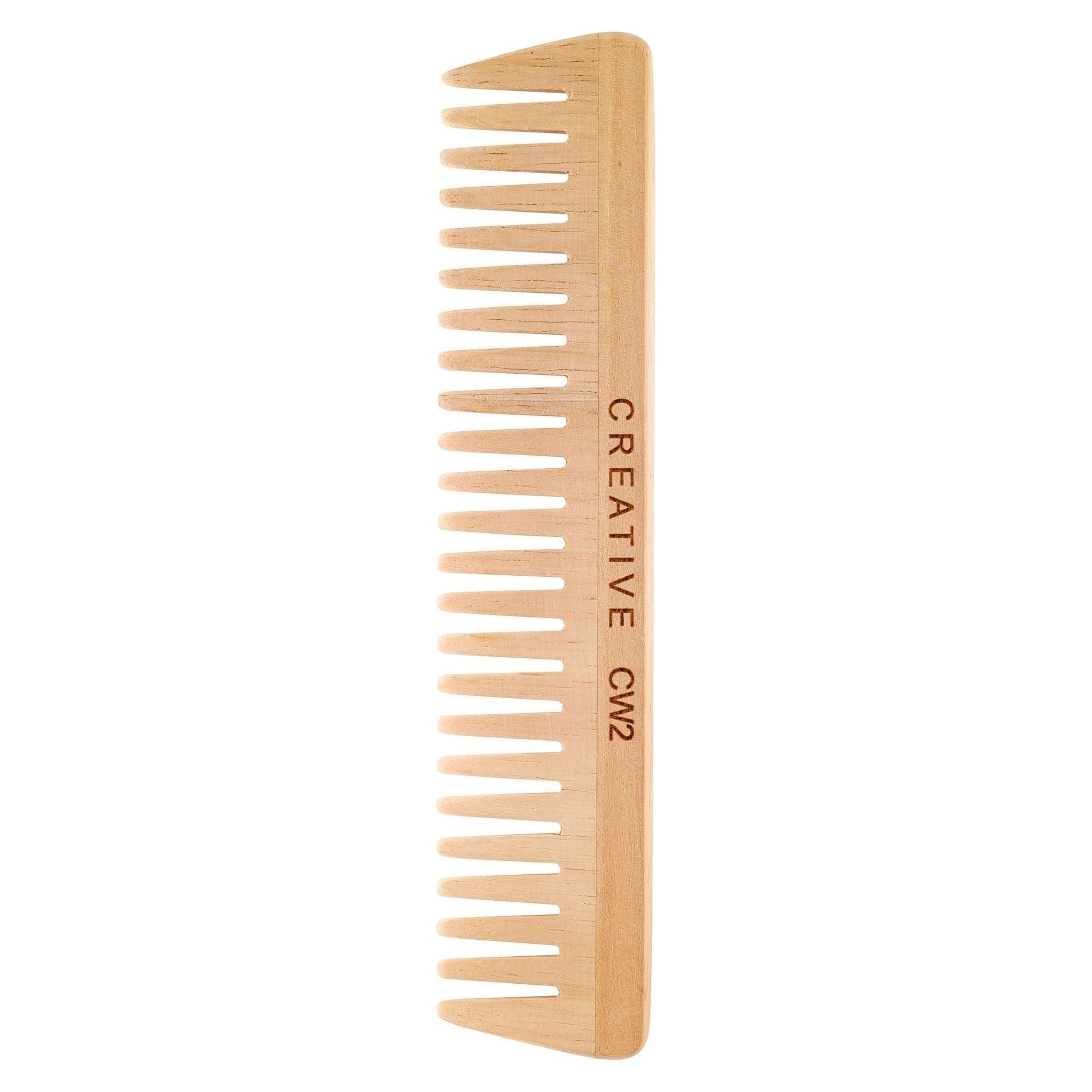 Birch wood hair combs by Pasteur Pharmacy featuring smooth, natural wooden teeth for gentle hair detangling and styling.