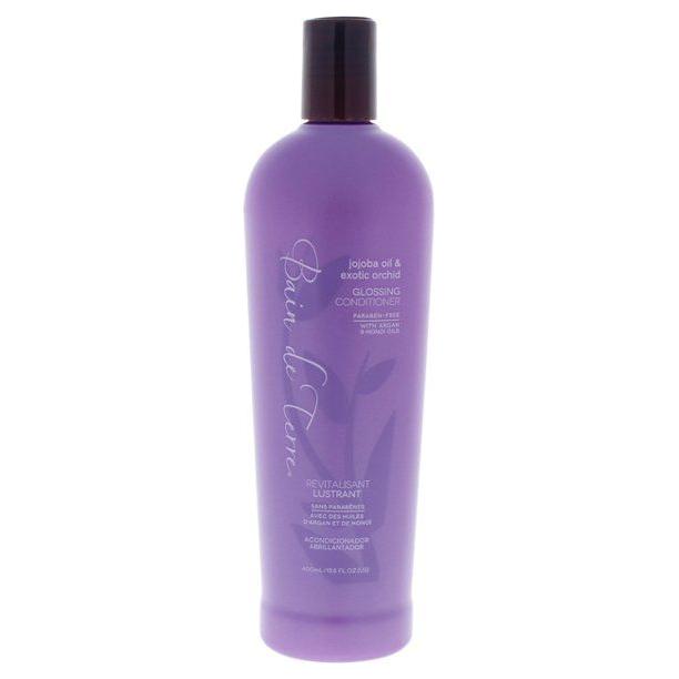 Bain De Terre Jojoba Oil and Exotic Orchid Glossing Conditioner in 13.5 fl oz bottle, smooth and shiny hair care product.