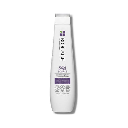 Matrix Biolage Ultra Hydrating Conditioning Balm in 13.5 fl oz bottle, nourishing hair conditioner with a sleek packaging design.