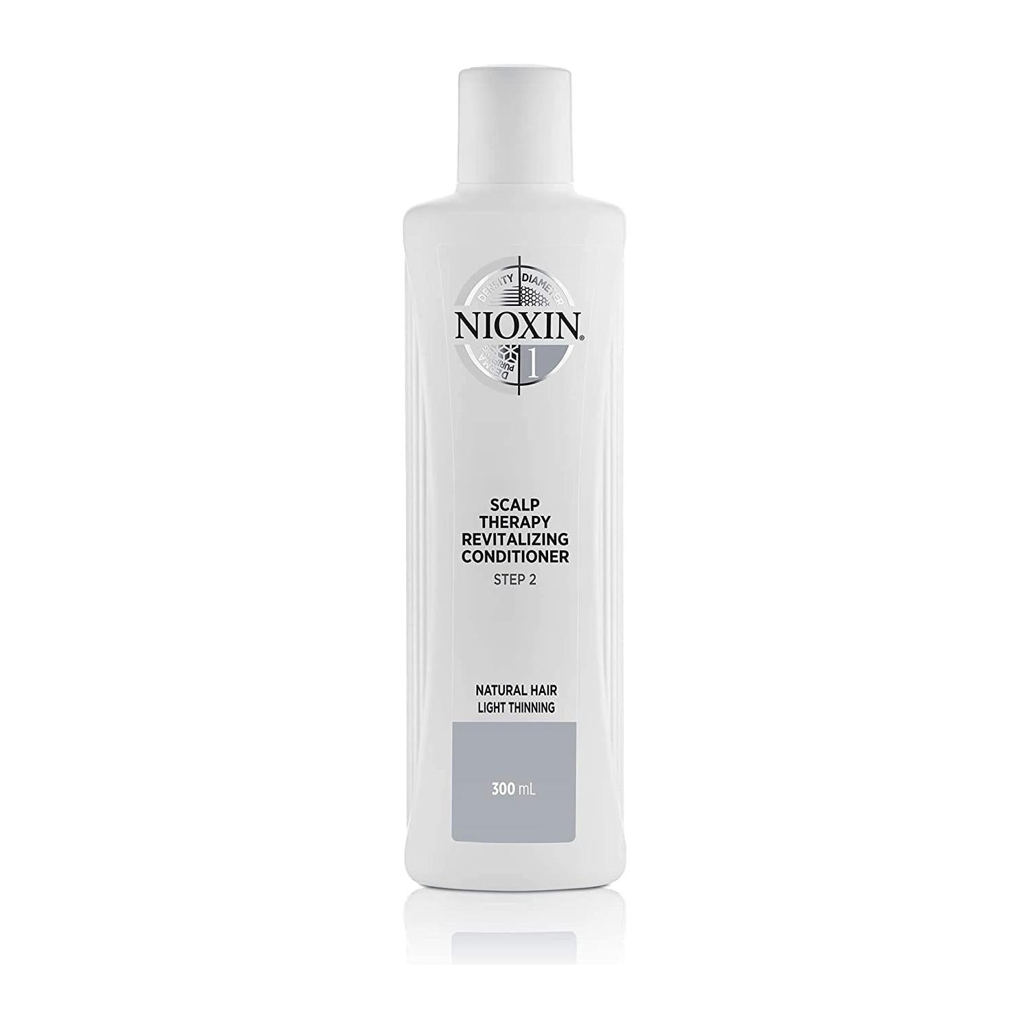 Nioxin Scalp Therapy System 1 Conditioner in a 25.4 fl oz bottle, nourishing hair and scalp for thinning hair care