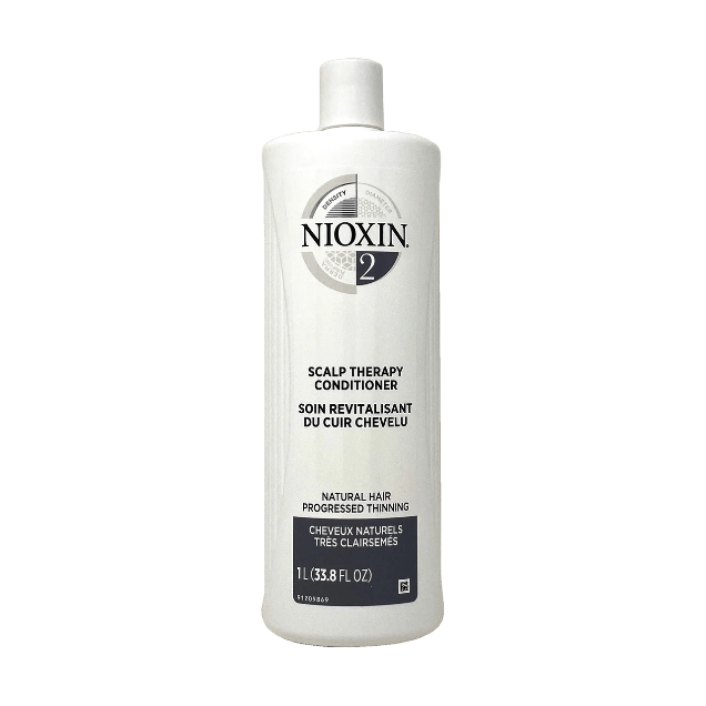 Nioxin Scalp Therapy System 2 Conditioner in 33.8 fl oz bottle, nourishing hair and scalp for thinning hair care.