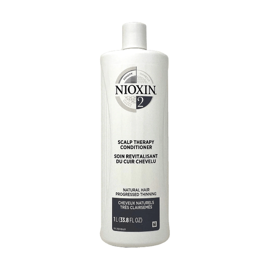 Nioxin Scalp Therapy System 2 Conditioner in 33.8 fl oz bottle, nourishing hair and scalp for thinning hair care.
