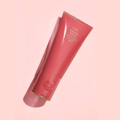 Oribe Bright Blonde Conditioner for beautiful color, 200ml, in a sleek hair conditioner bottle with a white and gold label.