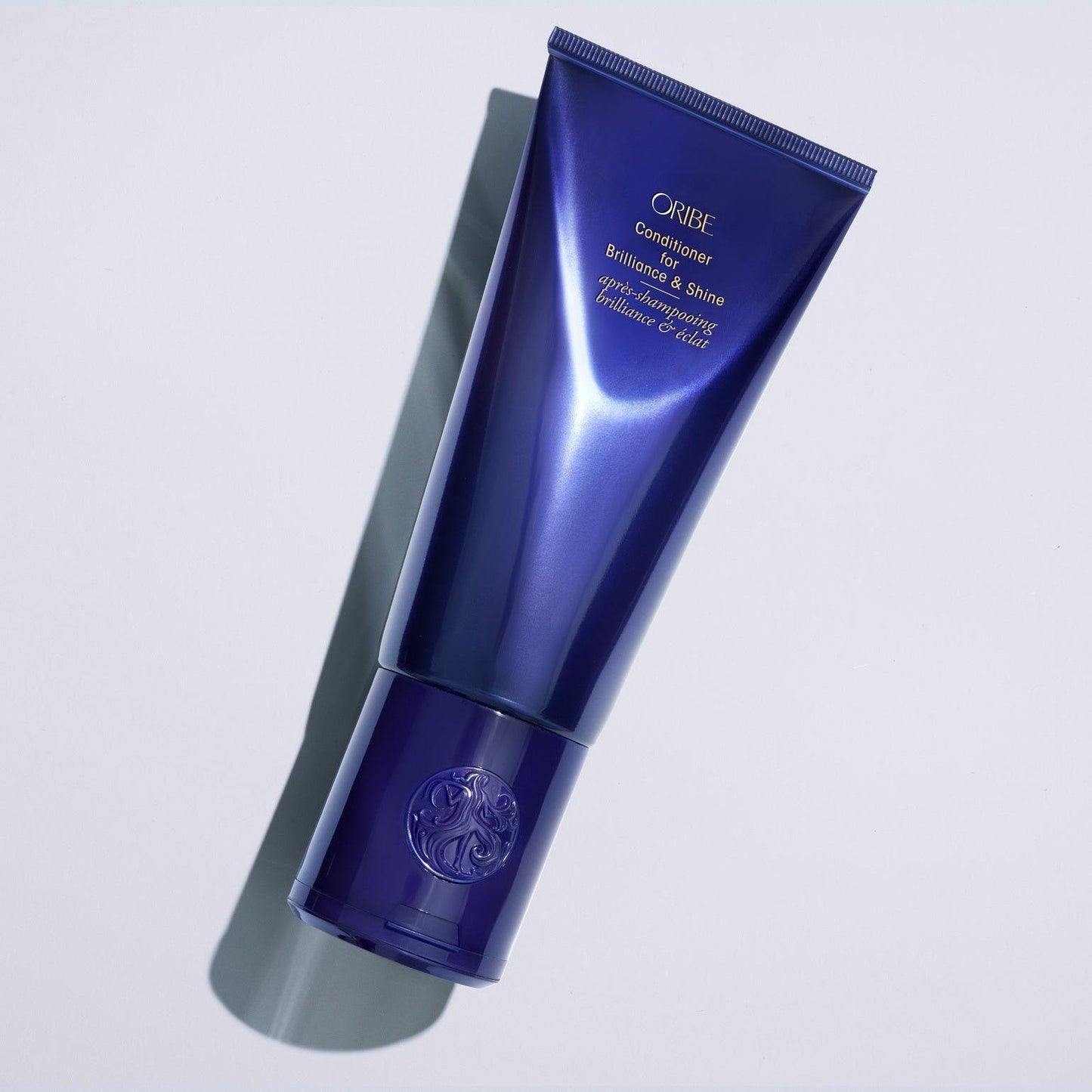 Oribe Conditioner for Brilliance & Shine in 200 ml, a luxurious hair conditioner with a sleek bottle and shiny label.