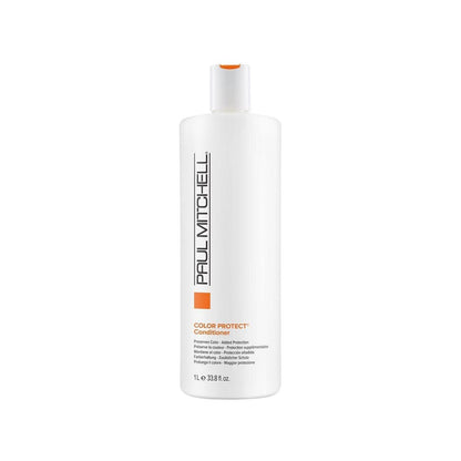 Paul Mitchell Color Care Daily Conditioner in 33.8 oz bottle, nourishing hair with color protection and hydration.