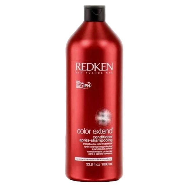 Redken Color Extend hair conditioner in a 33.8 oz bottle, designed to nourish and protect color-treated hair.