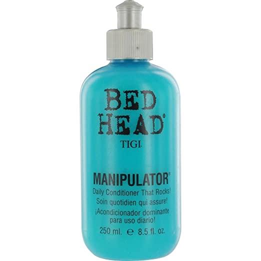 Tigi Bed Head Manipulator Hair Conditioner 8.5 oz bottle, designed to hydrate and style textured hair naturally.