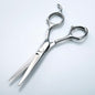 Seki Edge SS-703 stainless steel hair cutting scissors with ergonomic handles, designed for precise hair trimming.