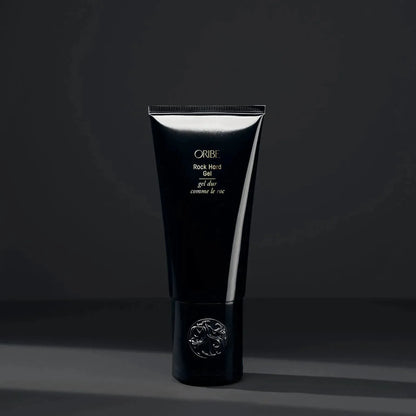 Oribe Rock Hard Gel 100ml hair gel in a clear jar with a black lid, designed for strong hold and styling control.