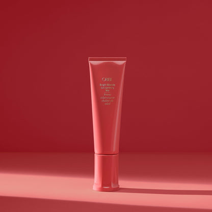 Oribe Bright Blonde Sun Lightening Mist in a 90 ml spray bottle, designed to brighten and lighten blonde hair naturally.