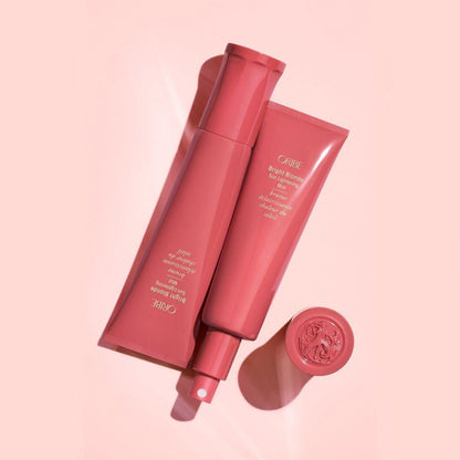 Oribe Bright Blonde Sun Lightening Mist in 90 ml spray bottle, designed to subtly brighten blonde hair.