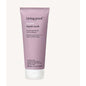 Living Proof Restore Hair Mask Treatment 1 oz in a white jar with a black lid, designed to nourish and repair damaged hair.