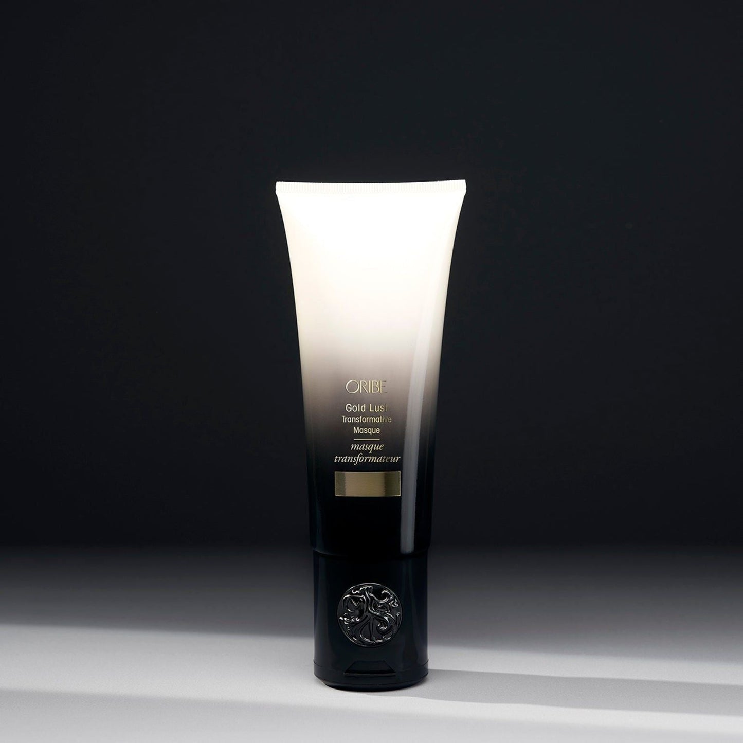 Oribe Gold Lust Transformative Hair Masque in 150 ml jar, creamy treatment for nourishing and revitalizing damaged hair.