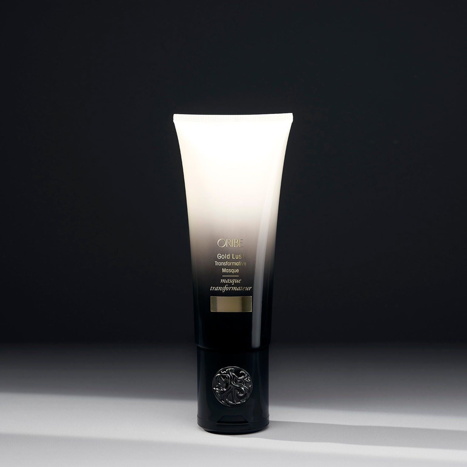 Oribe Gold Lust Transformative Hair Masque in 150 ml jar, creamy treatment for nourishing and revitalizing damaged hair.