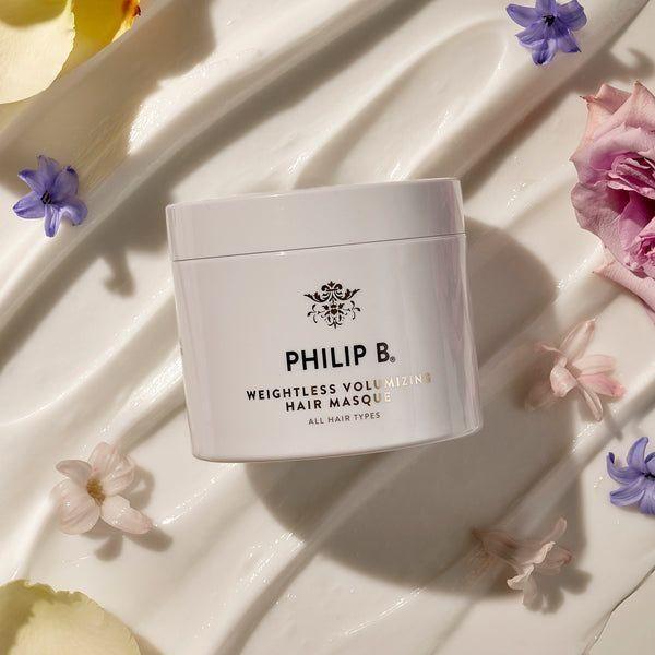 Philip B. Weightless Volumizing Hair Masque for all hair types in an 8 oz jar, shown with smooth, healthy hair.