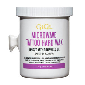 Gigi Tattoo Microwave Hard Wax infused with grapeseed oil in 8 oz jar for hair removal, shown in a close-up image.