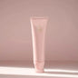 Oribe Serene Scalp Exfoliating Scrub in 125ml jar, showing the product container and label for hair scalp exfoliation.