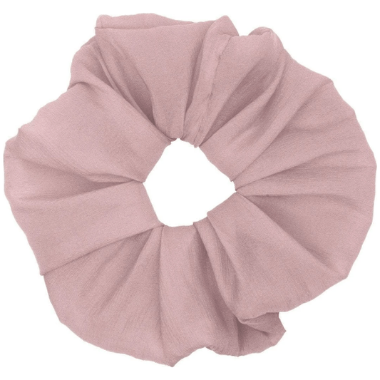 Pasteur Pharmacy KitSch Dinner Scrunchie 4-inch blush hair scrunchie on a model's hair, showcasing its soft fabric and stylish design.