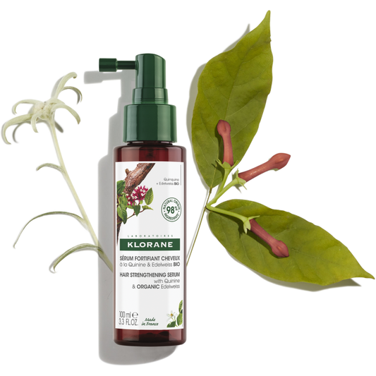 Klorane Hair Strengthening Serum with Quinine and Edelweiss in a 3.3 oz bottle, designed to boost hair strength and health.
