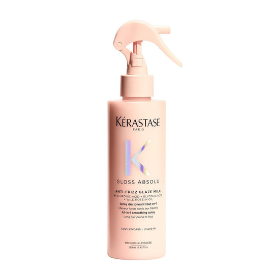 Kerastase Gloss Absolu Anti-Frizz Glaze Milk hair spray by Pasteur Pharmacy, 6.42 oz bottle with a sleek design and cap.