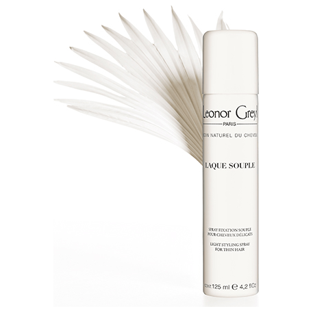Leonor Greyl Laque Hair Spray 125ml, lightweight hair spray with natural hold, displayed in a clear bottle with a white spray nozzle.